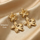 Boucles d'oreilles doubles fleurs brillantes dorées, acier inoxydable 316L – UniversBeauty