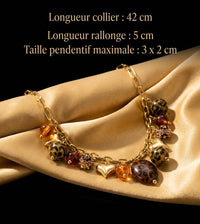 Collier doré à breloques léopard, gros plan, acier inoxydable – UniversBeauty
